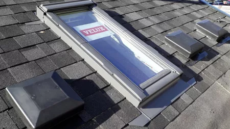 Skylight in shingle roof